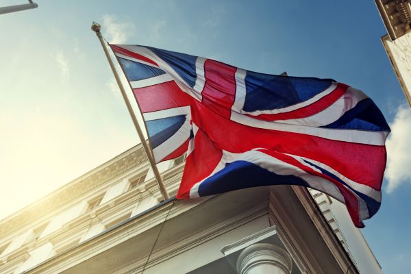 UK flag outside white building