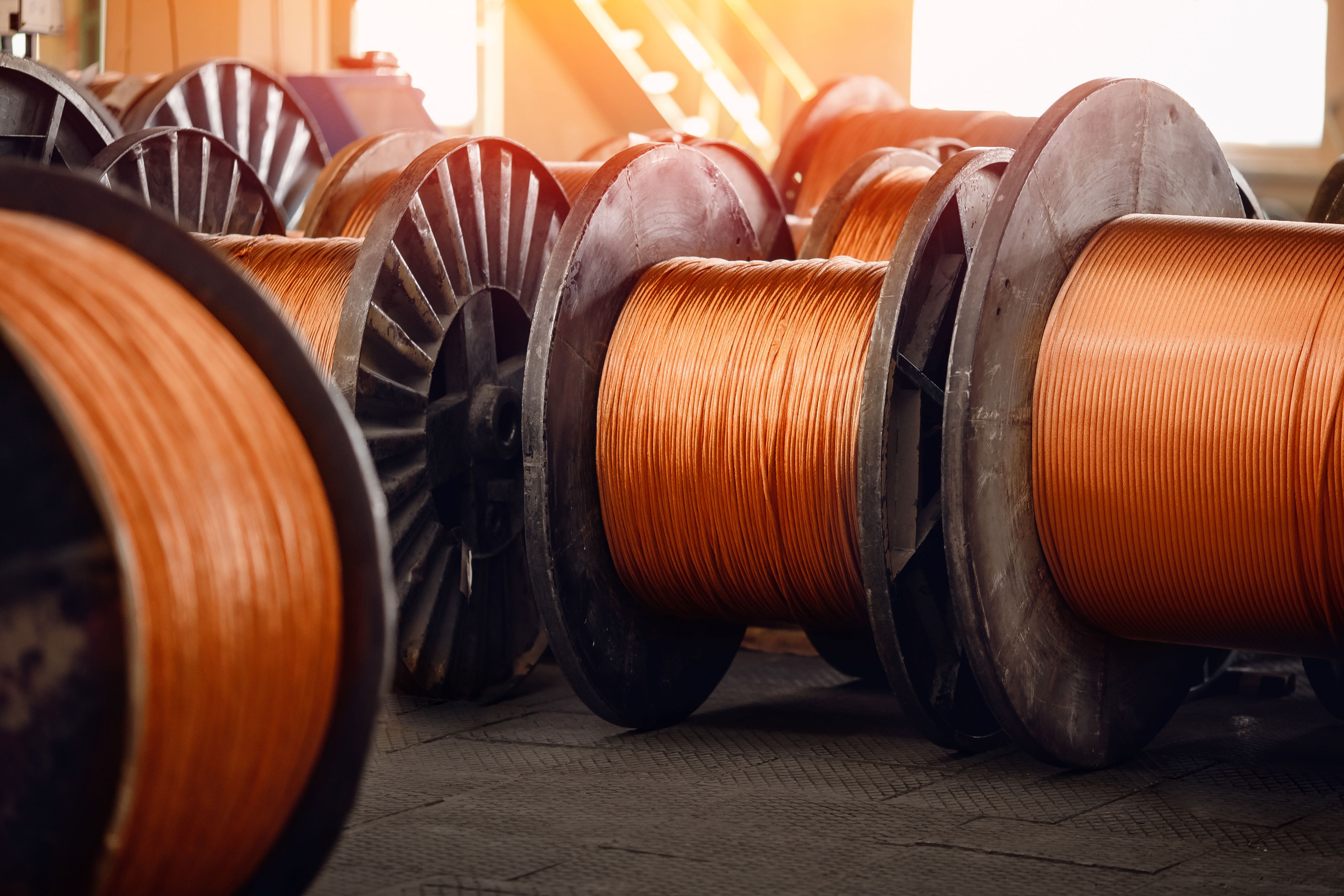 Production of copper wire, bronze cable in reels at factory