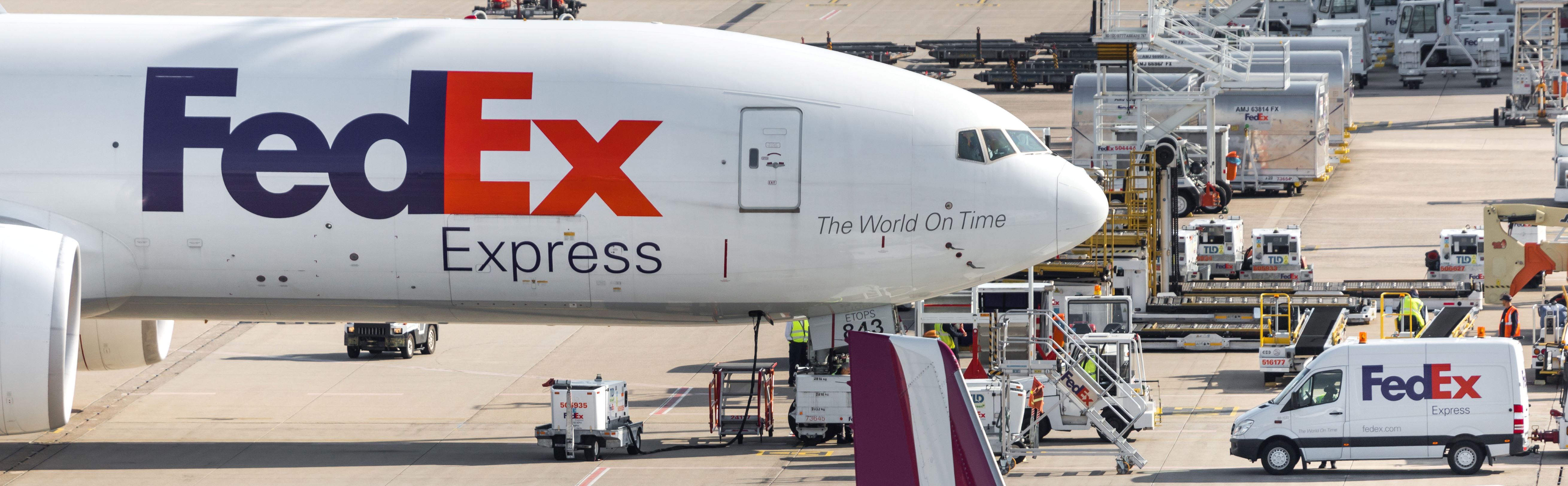 FedEx airline in airport with cargo being loaded