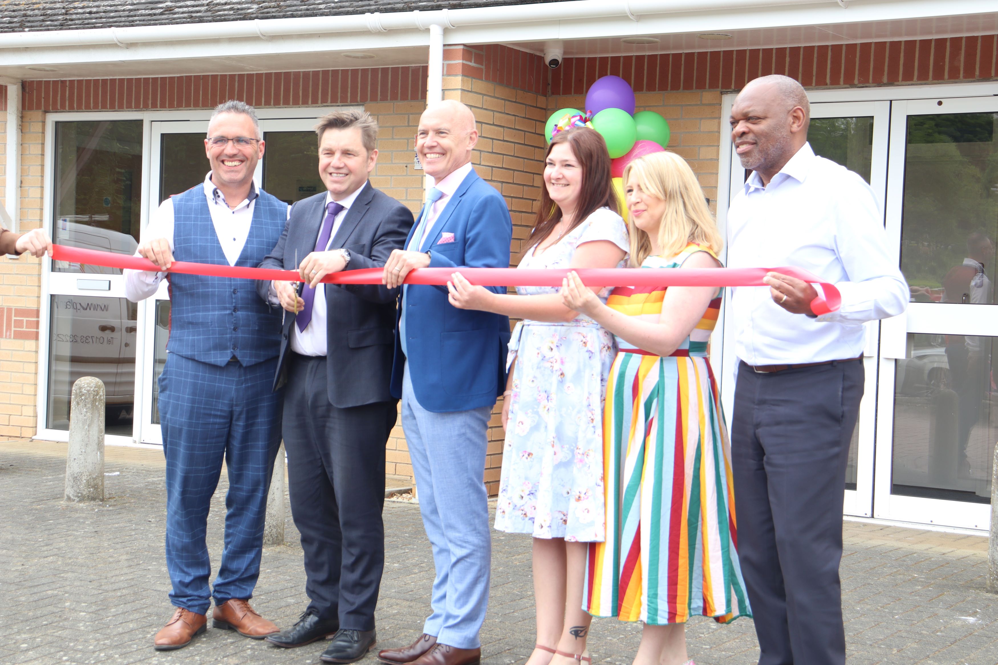 Members of IOE&IT with Peterborough mayor outside centre opening