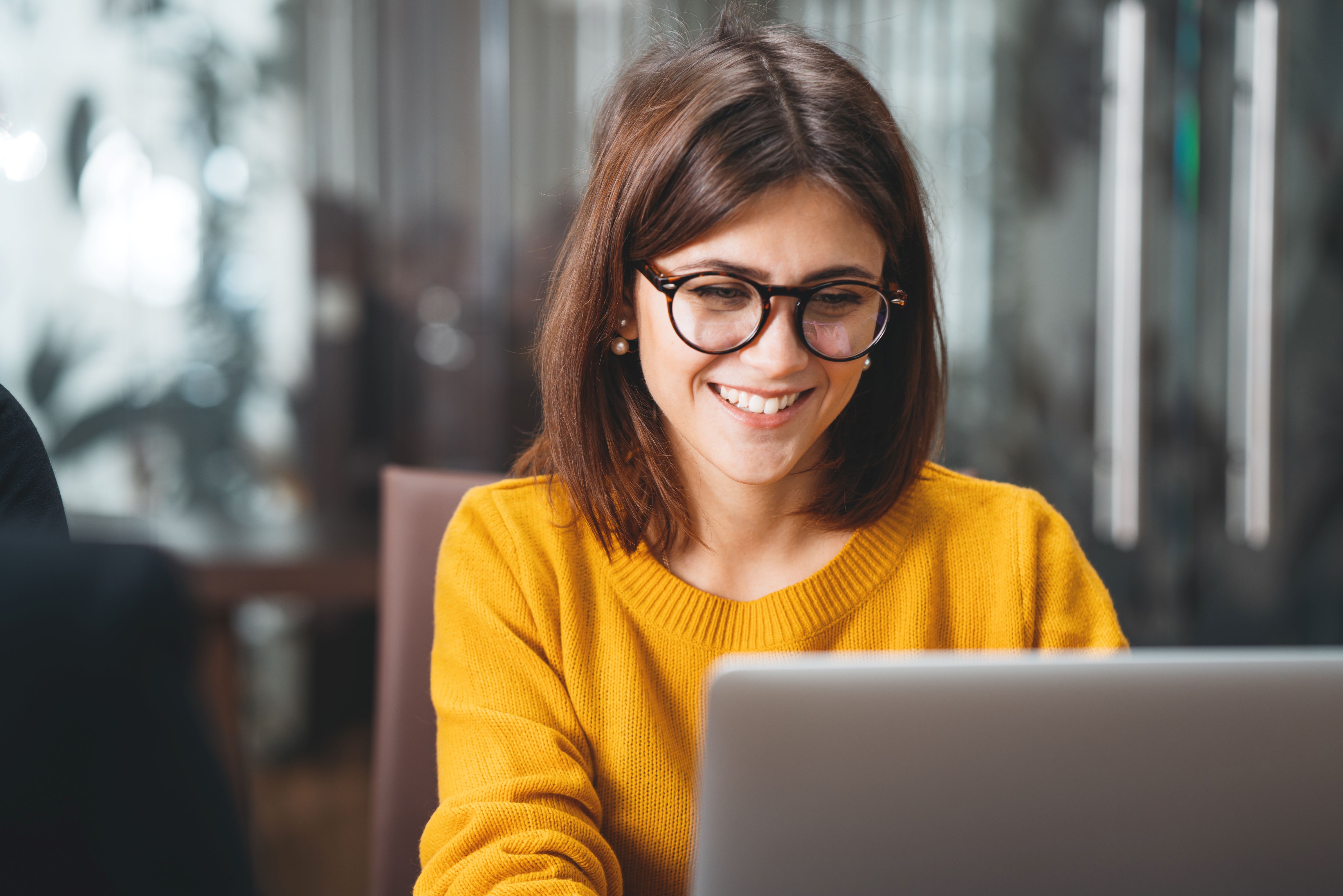 Woman in front of laptop