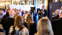 Marco Forgione speaking to a crowd of people at an international trade event
