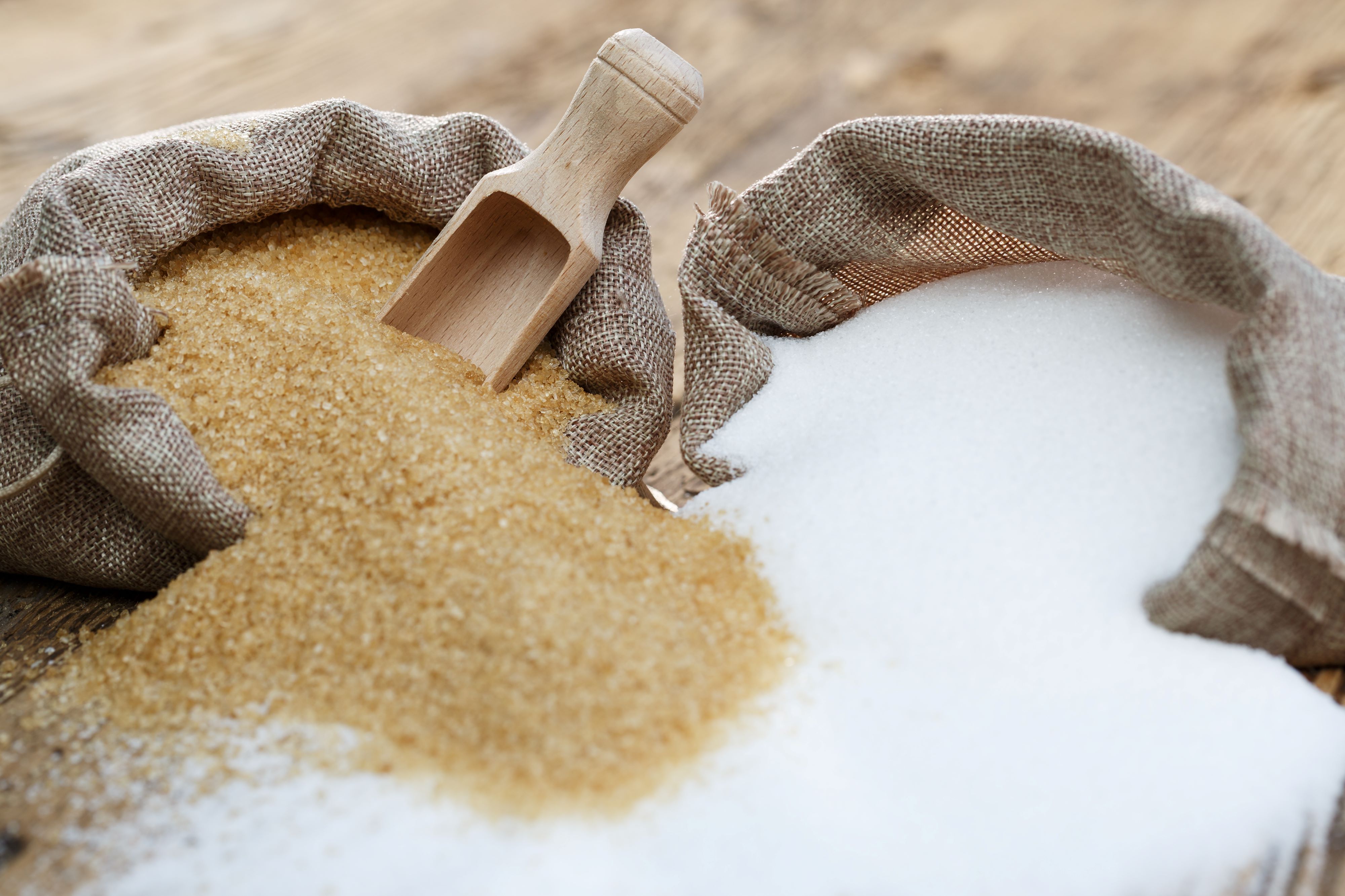 Bags of brown and white sugar