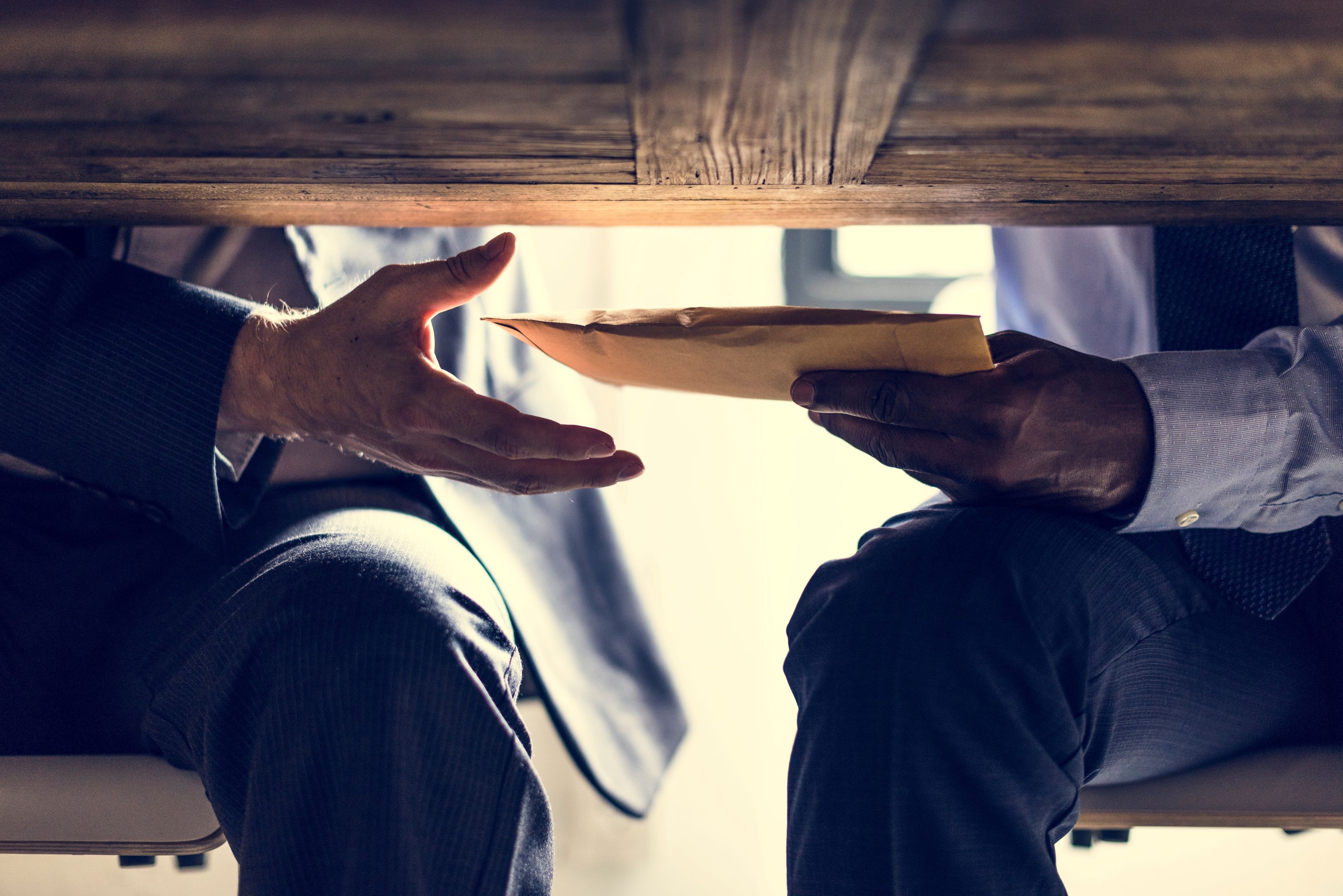 Package being shared under table classic example of corruption