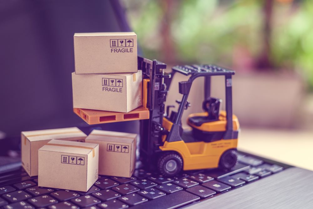 Toy forklift on a computer